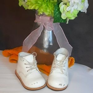 White tan hard bottom walking shoes